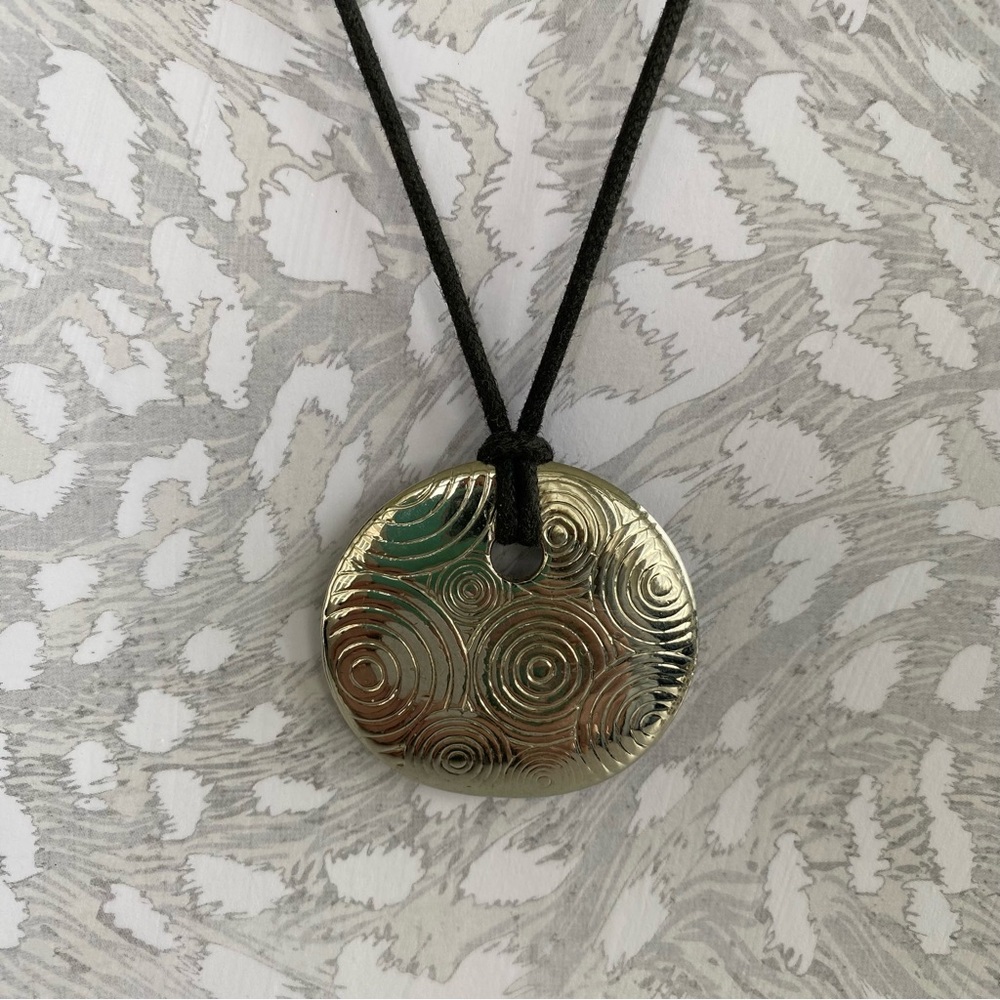 Lia Sophia Silver Oval Swirl Necklace with Black Leather Cord